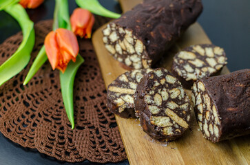 No bake chocolate salami - dessert of cookies, chocolate, butter and condensed milk