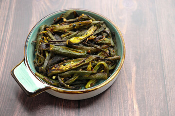 Bhindi Masala, stir-fried okra with Indian spices. Ladyfinger fry. Copy space. Bhendi ki sabzi.