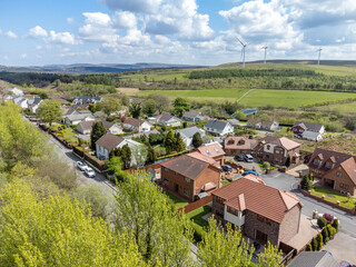 An aerial view of a village in the countryside of the Welsh Valleys