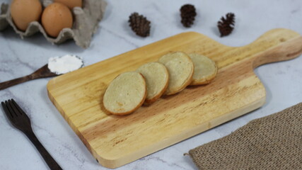 Delicious Serabi Cakes on Wooden Board: A Culinary Delight