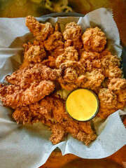 Fried Chicken Tenders And Fried Mushroom Basket With Honey Mustard