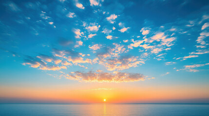 Limitless blue sky with golden sunrise and clean horizon