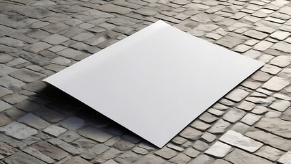 On a pavement wall is a mockup white paper or white sticker poster. Details with a clipping route and promotion information for marketing announcements
