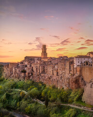 Fototapeta premium Tuscany, Pitigliano medieval village panorama sunset. Italy