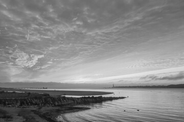 Kiel fjord at the Baltic Sea  with dramatic sky in black and white.
