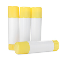 Many different glue sticks isolated on white