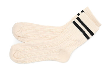 Pair of soft socks isolated on white, top view