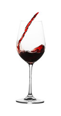 Tasty wine splashing in glass on white background