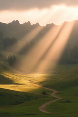 Sunbeams over a winding path in a green valley