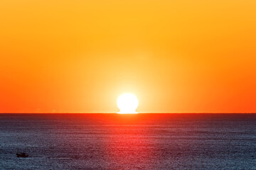 Sea sunrise landscape. rising sun - Omega phenomenon, omega sunrise