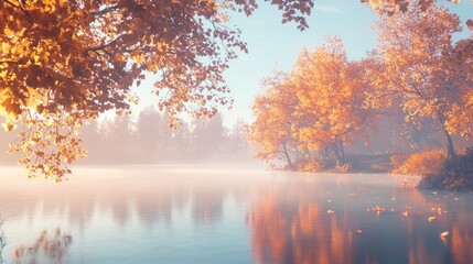 Misty autumn lake reflecting golden trees at sunrise.