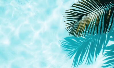 Fototapeta premium Tranquil Pool Water with Shadows and Tropical Palm Leaf Creating a Serene Summer Atmosphere for Relaxation and Vacation Vibes in Bright Blue Shades