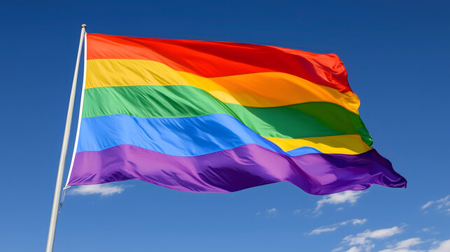 Pride Rainbow Flag Waving in the Sky - LGBTQ+ Symbol of Equality and Love