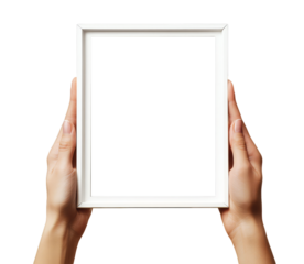 Two hands holding a blank white picture frame are isolated on a transparent background.