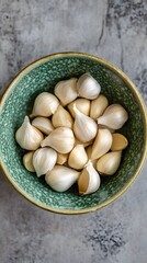 delicious garlic cloves in a bowl