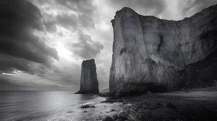 a rock formation in the fog