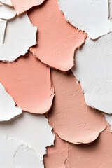 Fototapeta premium Peeling paint in soft peach and white hues creates an abstract, textured background with a blend of colors and layers.