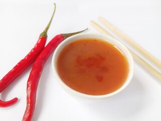red hot chili sauce isolated on white beground