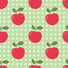 Seamless pattern with red apples on a green background