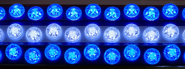 Amusement park . Ferries at night. Disco lights. Colorful Illumination. Light bulbs. 