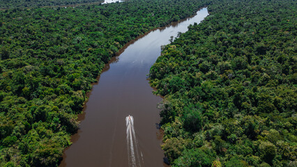 AERIAL PHOTOS OF THE NANAY RIVER AND BOATS NAVIGATING IN ITS WATERS, IN THE PERUVIAN AMAZON JUNGLE,...