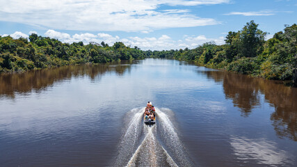 AERIAL PHOTOS OF THE NANAY RIVER AND BOATS NAVIGATING IN ITS WATERS, IN THE PERUVIAN AMAZON JUNGLE,...