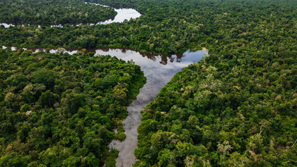 AERIAL PHOTOS OF THE NANAY RIVER AND BOATS NAVIGATING IN ITS WATERS, IN THE PERUVIAN AMAZON JUNGLE,...