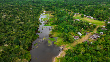 AERIAL PHOTOS OF THE NANAY RIVER AND BOATS NAVIGATING IN ITS WATERS, IN THE PERUVIAN AMAZON JUNGLE,...