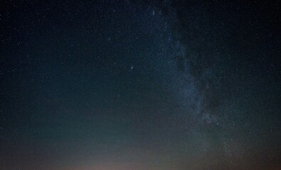 Starry sky over Dolomites, background.