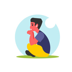 boy sitting on the lawn