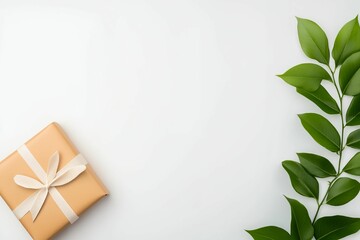 Brown box with a white ribbon sits on a white background