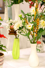 Original flowers made of polymer clay. The most realistic display. Soft focus. Close-up.