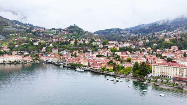 Idyllic lakeside town Menaggio on Lake Como with mountain views, Lombardy region, Italy. Aerial view