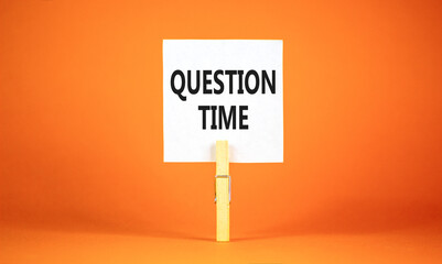Question time symbol. Concept words Question time on beautiful white paper on wooden clothespin....
