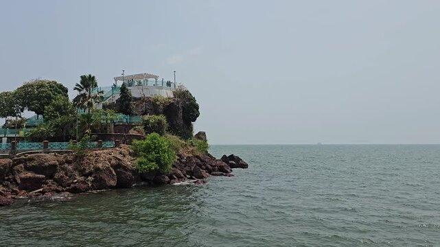 The Dona Paula viewpoint A rocky outcrop overlooking the sea with a small pavilion on top.