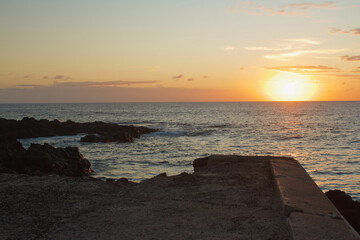 view of the sunset near seashore at moroni Island in Comores