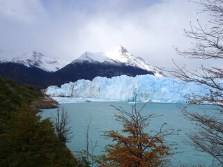Perito Moreno, scenic glacier in El Calafate, patagonia argentina. Panoramic landscape with clouds in the sky and mountains