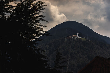 A view of a church perched on the mountain as seen from Monserrate in Bogot&aacute;, Colombia.