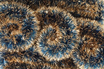 Beautiful shiny tinsel as background, closeup view