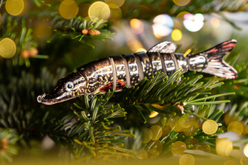Christmas and  New Year  fishing concept.  Wobbler pike  on Christmas tree.