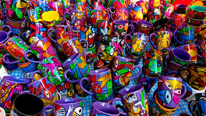 Fototapeta premium hand-painted ceramic coffee mugs and cups hand crafted by rural artisans from indian villages. 