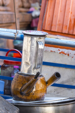 a cloth filter containing ground coffee at a cafe in Phnom Penh	
