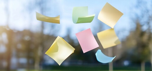 Colorful sticky notes floating in the air, symbolizing ideas and creativity.
