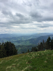 Scenic view from a mountain top in cloudy weather