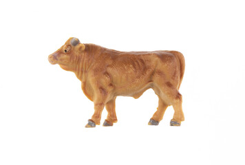 toy plastic cow isolated on white background