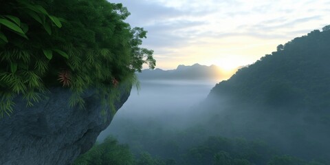 Obraz premium A mountain range with a foggy sky and a lush green forest. The sun is setting in the distance, casting a warm glow over the landscape. The scene is serene and peaceful