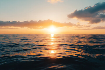 Fototapeta premium A breathtaking sunset over the calm ocean, casting vibrant colors across the waves and creating a serene atmosphere for relaxation and reflection.