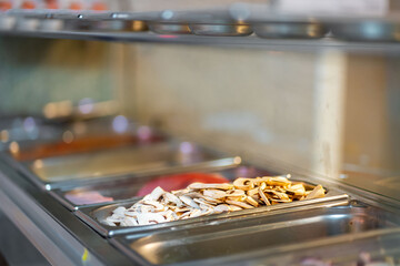 Restaurant kitchen. Champignions ready for pizza HoReCa sphere.