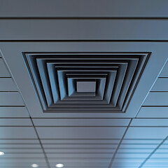 Obraz premium A ceiling with a square air vent in the middle of it