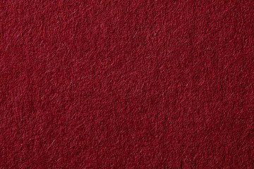 Red fluffy velvet texture background. Red velvet fabric